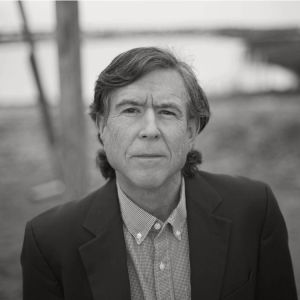 Book Review of The Case of the Disappearing Beaune: A Sherlock Holmes Christmas Story. Author photo of J. Lawrence Matthews.